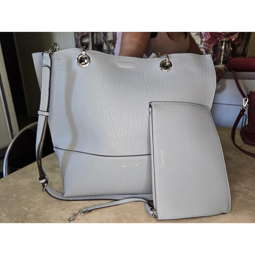 Calvin Klein blue reversable leather tote with matching pouch